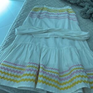 white sundress with pink and yellow rikrak detail fully lined cotton and linen
